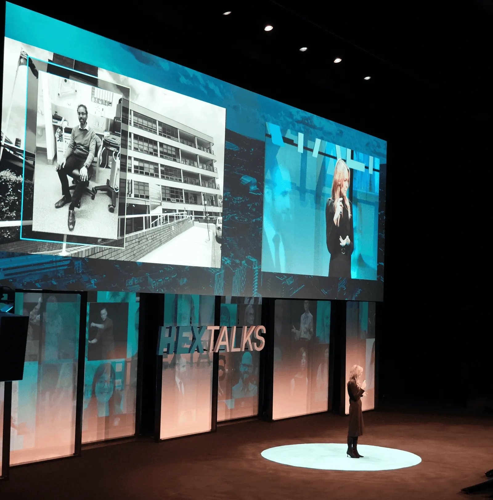Presenter on stage with audience at a Left Field live event
